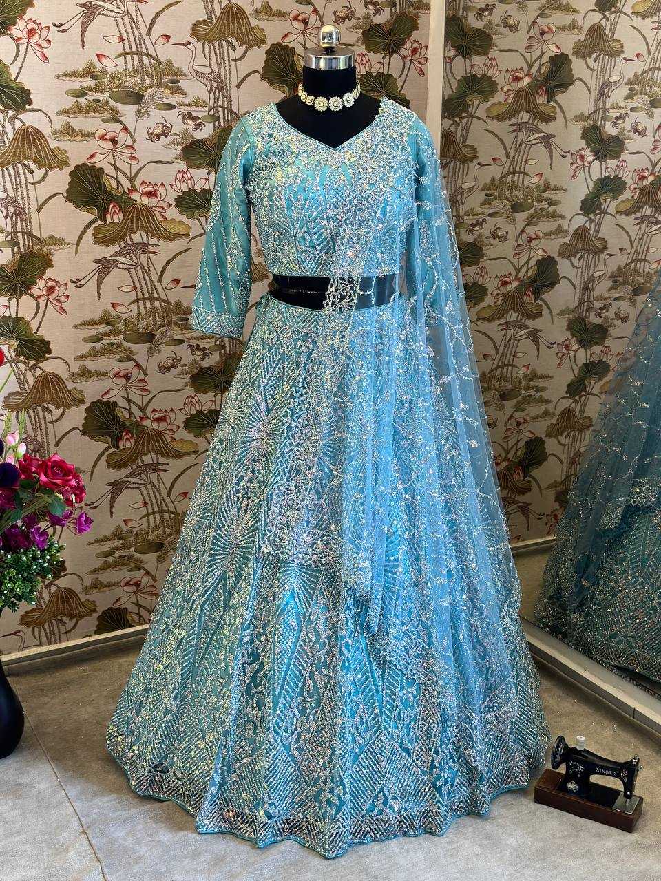 YNF NET RIN114 5027 LEHENGAS WHOLESALE DESIGNER FANCY NET FANCY EMBROIDERED LEHENGAS MANUFACTURER