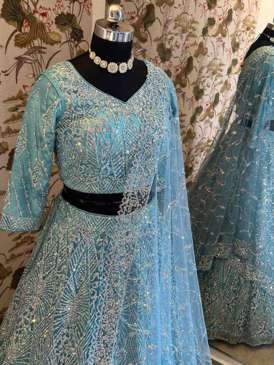 YNF NET RIN114 5027 LEHENGAS WHOLESALE DESIGNER NET FANCY EMBROIDERED BLUE LEHENGAS MANUFACTURER