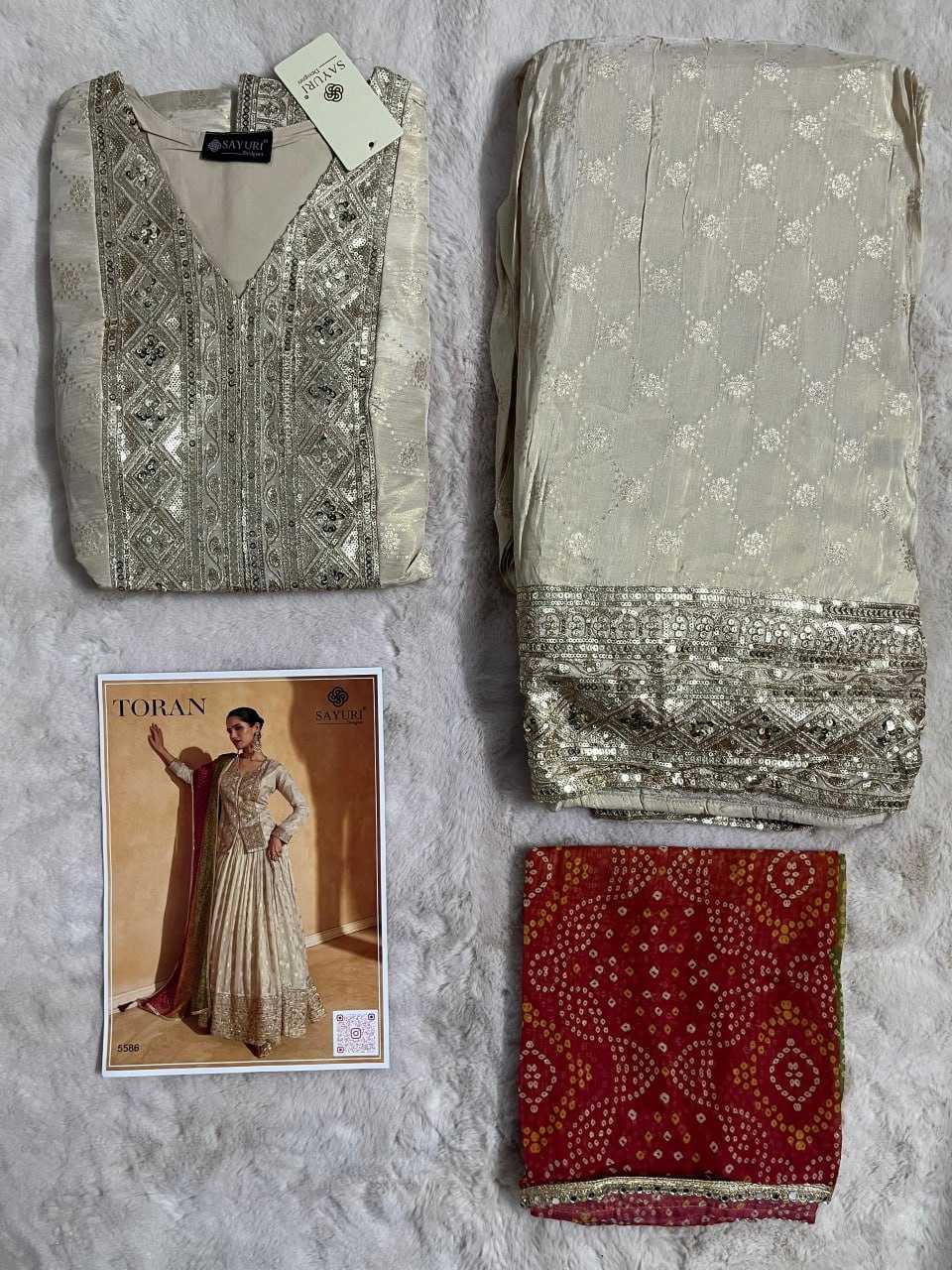 YNF JACQUARD SILK SAYURI KESH233 TORAN CLOTHING BRANDS WHOLESALE LEHENGAS MANUFACTURER